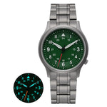 The Berny watch features a titanium band and an elegant green dial. It showcases luminous hands and markers for optimal visibility in dark conditions, as shown in the inset. This watch elegantly balances style with functionality, ideal for any setting.