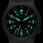 This Berny watch displays a luminous glow for enhanced visibility in the dark. The black dial features both 12-hour and 24-hour markers, with glowing hands and numbers for easy time reading. The design blends style with functionality, perfect for nighttime use.